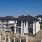 Просторный дом в 2 уровня на продажу – Новые Гояны